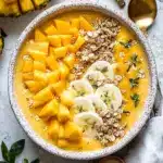 creamy mango pineapple smoothie bowl - featured image